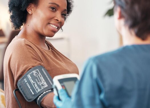 Person getting their blood pressure checked